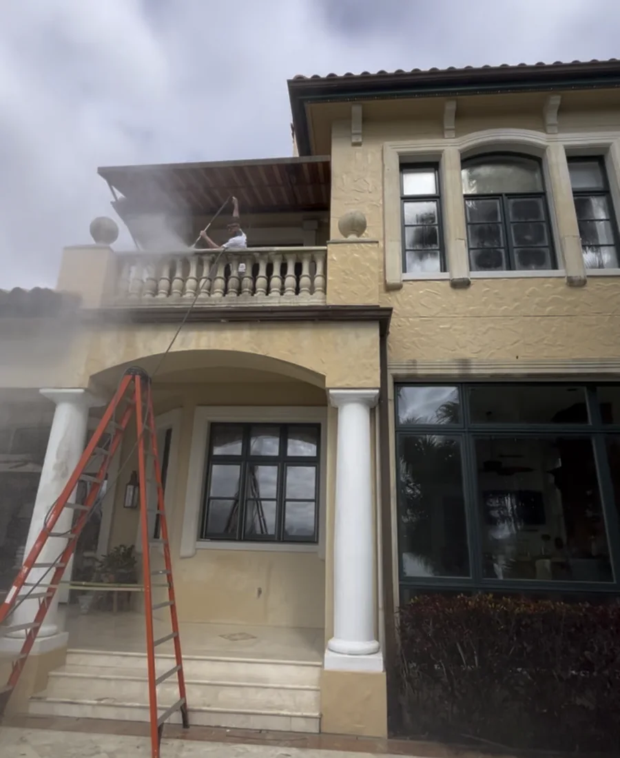Exterior cleaning in progress on a Tampa Bay home